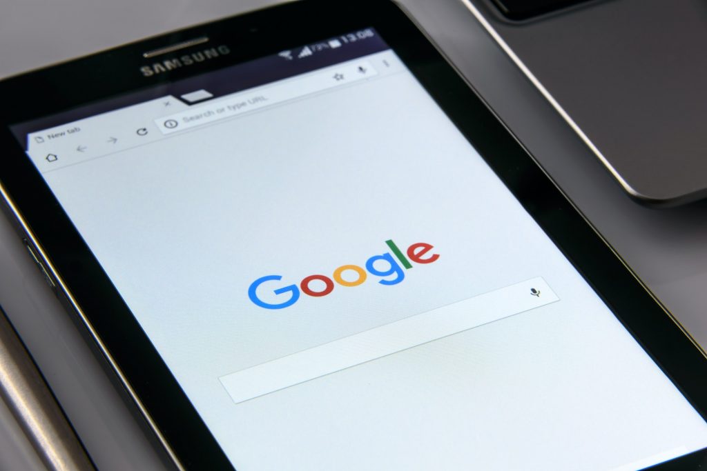 Tablet with the Google search engine open. SEO company.
